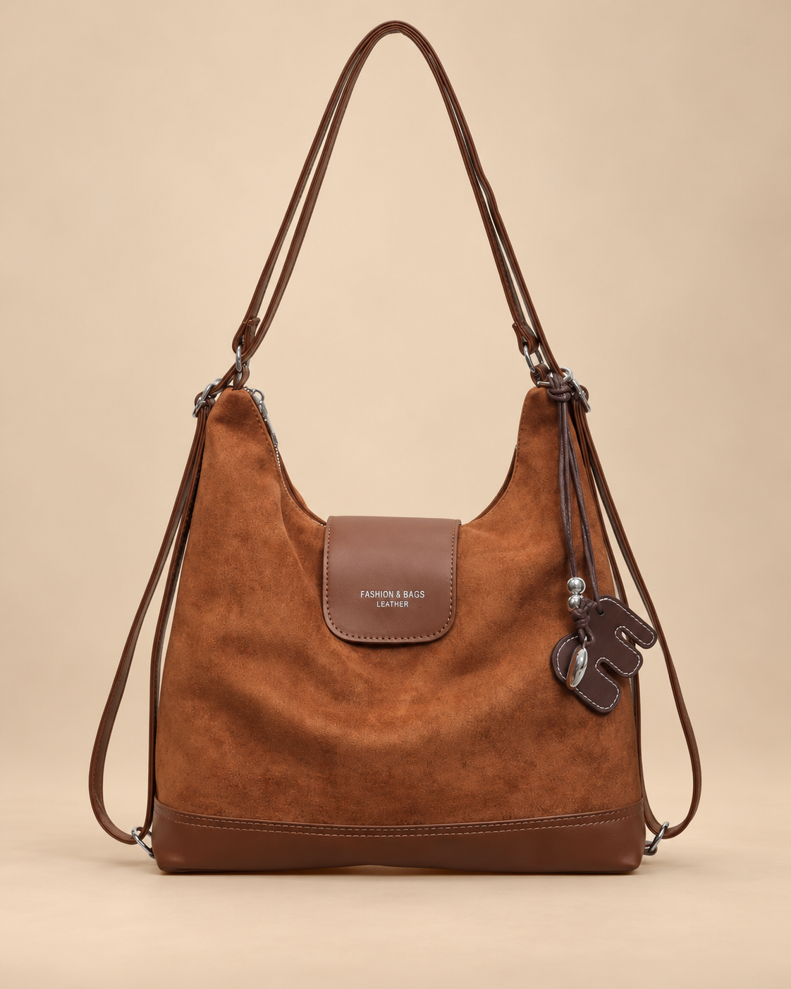 Brown suede-effect hobo bag on a warm beige background